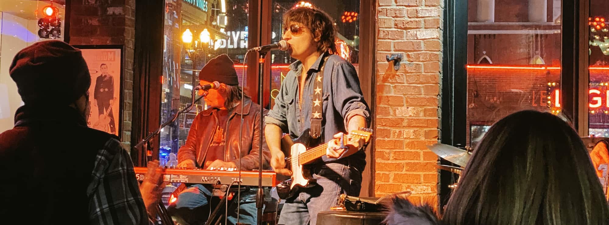 bar singer on guitar in Raleigh