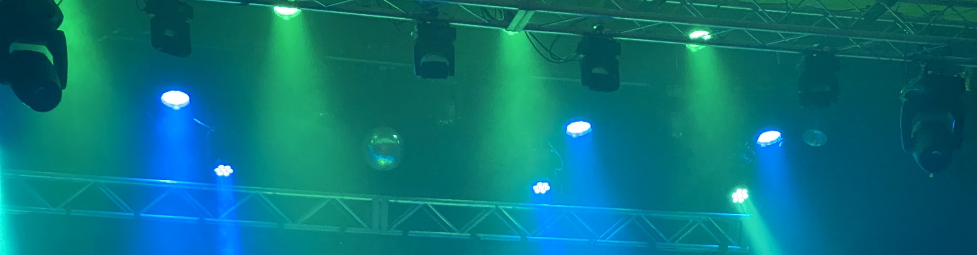 blue and green theater stage lights Raleigh