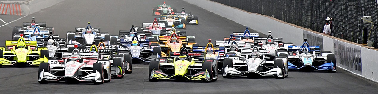 indy cars racing to through the start line Raleigh
